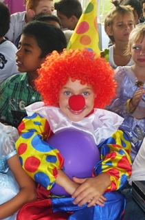 Elise with her colourful clown costume.